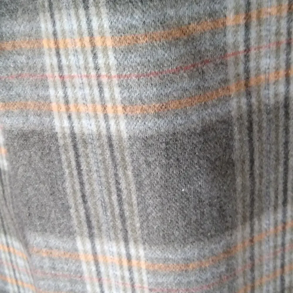 A new day plaid scarf. NEW 10X72